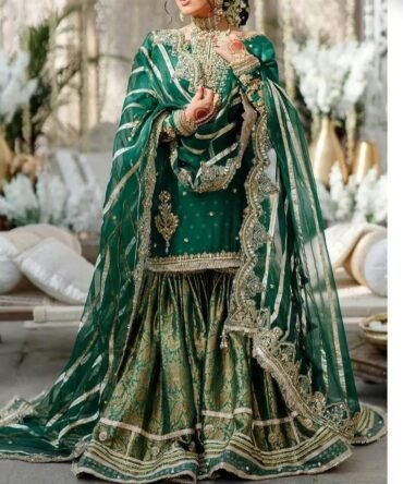 Emerald Elegance: A Mesmerizing Mehndi in Green Sharara Bliss