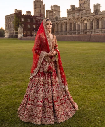 Regal Red Bridal Lehenga Choli Featuring Hand Embellished Raw Silk & Net Dupatta